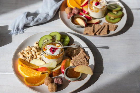 Kids food platter with crackers, fruit and taylor pass honey