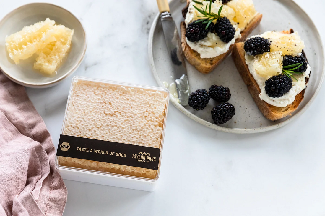 Honeycomb with blackberries on sourdough