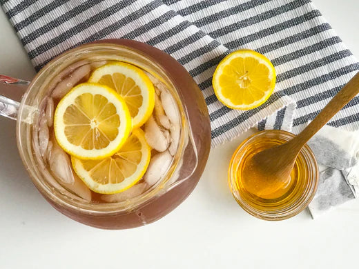 caraffe of iced tea with lemons